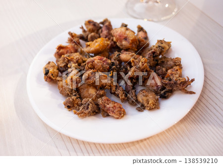 Spanish seafood dish battered fried baby squid 138539210