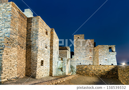 The illuminated stone architecture of the historic Thee Ain Heritage Village at night in Al Bahah, Saudi Arabia. The illuminated stone architecture of the historic Thee Ain Heritage Village at night in Al Bahah, Saudi Arabia. 138539332