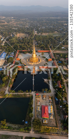 Aerial view of Phra Mahathat Chedi Sri Wiang Chai one of the biggest pagoda in Thailand, with the base of about 1,600 square metres located in Li district, Lamphun province. Aerial view of Phra Mahathat Chedi Sri Wiang Chai one of the biggest pagoda in Thailand, with the base of about 1,600 square metres located in Li district, Lamphun province. 138542380