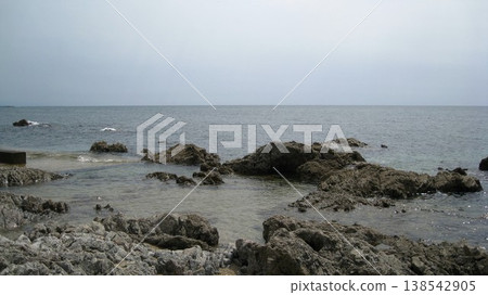 The calm summer scenery of the Sea of Japan and its unusual rock formations. 138542905