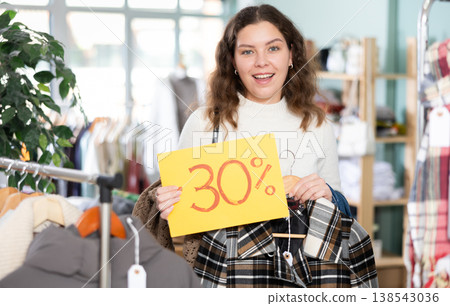 Woman rejoices at the start of sales in the store 138543036