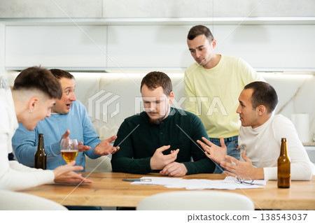 Friends comforting upset man receiving unpleasant news Friends comforting upset man receiving unpleasant news 138543037
