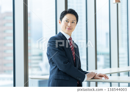 Middle-aged businessman working in an office. Photo courtesy of Denpa Gakuen, Tokyo Electronics College. Middle-aged businessman working in an office. Photo courtesy of Denpa Gakuen, Tokyo Electronics College. 138544003