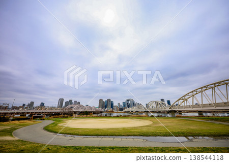 Juso Ohashi Bridge over the Yodo River and the cityscape of Umeda Juso Ohashi Bridge over the Yodo River and the cityscape of Umeda 138544118