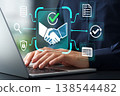 Automated contract management and legal document system. Contract and approval icons. Business using a laptop. 138544482