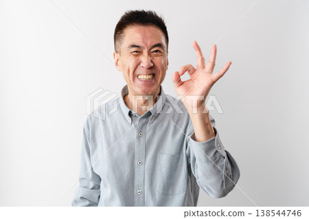 A senior man in casual clothes standing – a lifestyle image. 138544746