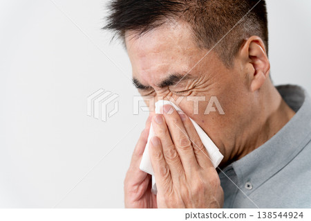 A senior man in casual clothes standing – a lifestyle image. A senior man in casual clothes standing – a lifestyle image. 138544924