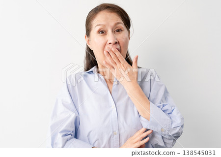 A senior woman in casual clothes standing – a lifestyle image. 138545031