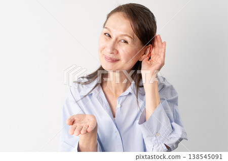 A senior woman in casual clothes standing – a lifestyle image. 138545091