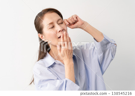 A senior woman in casual clothes standing – a lifestyle image. 138545216