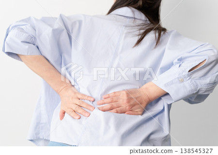 A senior woman in casual clothes standing – a lifestyle image. 138545327