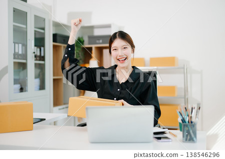 Small business entrepreneur SME freelance woman working at home office, BOX,tablet and laptop online, marketing, packaging, delivery,  e-commerce concept 138546296