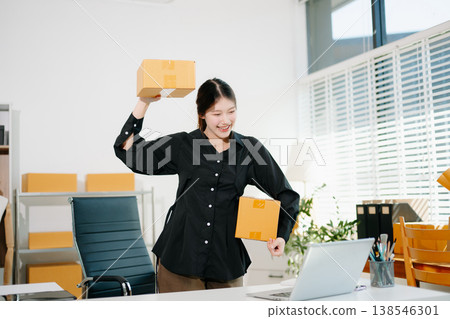 Small business entrepreneur SME freelance woman working at home office, BOX,tablet and laptop online, marketing, packaging, delivery, e-commerce concept Small business entrepreneur SME freelance woman working at home office, BOX,tablet and laptop online, marketing, packaging, delivery, e-commerce concept 138546301