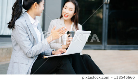Asian businesswomen discussing career planning and new job opportunity with laptop, teamwork collaboration, professional consulting Asian businesswomen discussing career planning and new job opportunity with laptop, teamwork collaboration, professional consulting 138546660