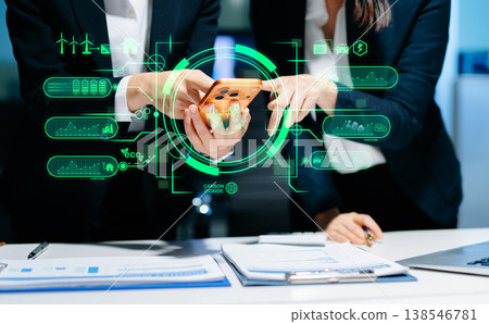 Business team working virtual modern smartphone to reduce CO2 emissions carbon footprint climate change to limit global warming.Sustainable development and green business concept. at office 138546781