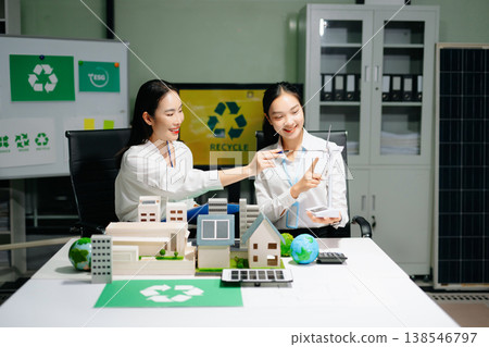 Businesspeople in team meeting for ESG focused business team discussing sustainability, net zero goals, and green washing strategies. Businesspeople in team meeting for ESG focused business team discussing sustainability, net zero goals, and green washing strategies. 138546797