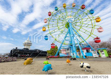 Shiroyama Park in Kirishima City, Kagoshima Prefecture: Ferris wheel and observation tower, a family-friendly tourist spot with cherry blossoms and playground equipment. Shiroyama Park in Kirishima City, Kagoshima Prefecture: Ferris wheel and observation tower, a family-friendly tourist spot with cherry blossoms and playground equipment. 138547326