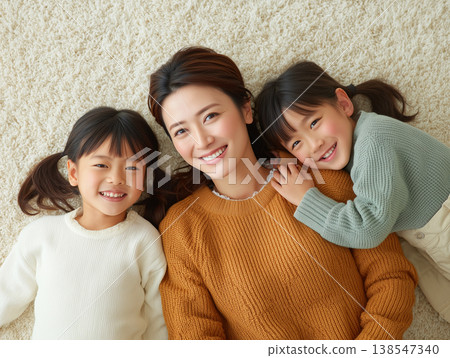 A heartwarming portrait of a mother and child smiling. 138547340