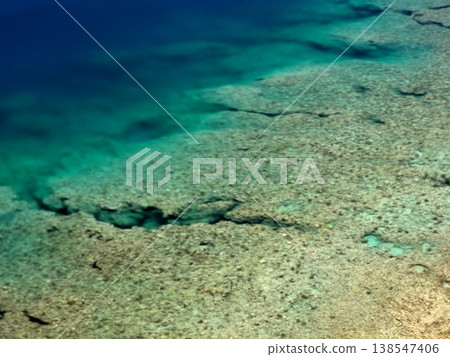The sea surface viewed from atop a cliff at Cape Maeda, Onna Village, Okinawa Prefecture The sea surface viewed from atop a cliff at Cape Maeda, Onna Village, Okinawa Prefecture 138547406