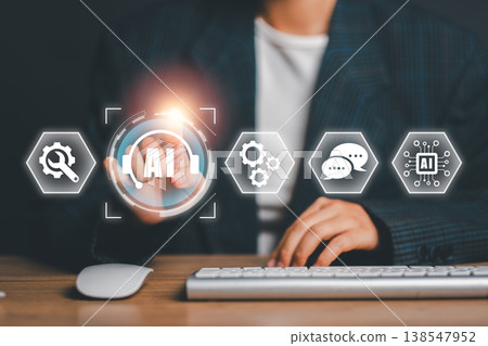 Businessperson using a digital interface with AI icons, symbolizing innovation and technology in a modern workspace. Businessperson using a digital interface with AI icons, symbolizing innovation and technology in a modern workspace. 138547952