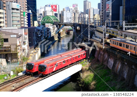 View of Tokyo Metro and JR trains crossing from Hijiribashi Bridge 138548224