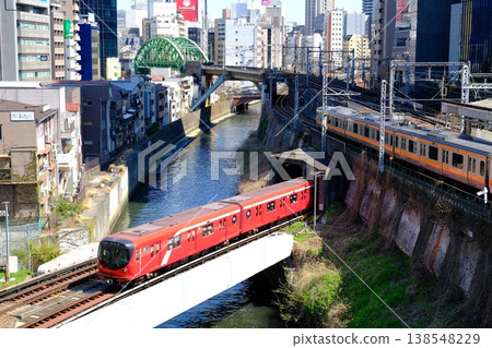 View of Tokyo Metro and JR trains crossing from Hijiribashi Bridge 138548229