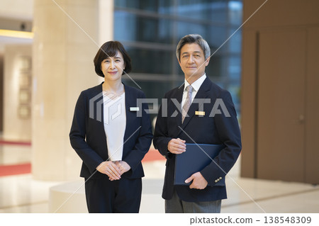 Senior business professionals (male and female) - Front desk staff image Senior business professionals (male and female) - Front desk staff image 138548309