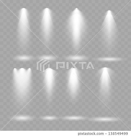 Realistic White Spotlight Beams Set. Vector Stage Illumination and Glowing Light Rays on Transparent Background. Realistic White Spotlight Beams Set. Vector Stage Illumination and Glowing Light Rays on Transparent Background. 138549499