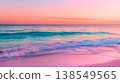 pink and turquoise ocean at sunset, with the sky painted in shades of orange, purple, blue, and green, reflecting on the calm waters near an exotic beach 138549565