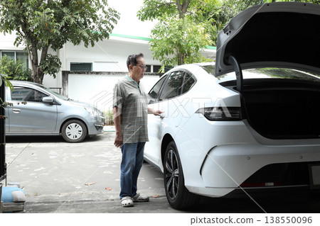 Senior Man with White EV 138550096