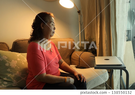 Senior Woman by the Window Senior Woman by the Window 138550132