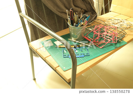 Model Kit Parts on Bench Model Kit Parts on Bench 138550278