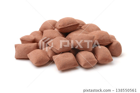 Heap of cocoa pillow candies Heap of cocoa pillow candies 138550561