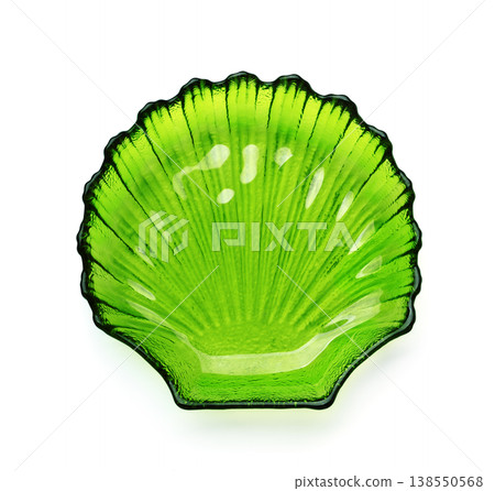 Empty green glass sea shell plate 138550568