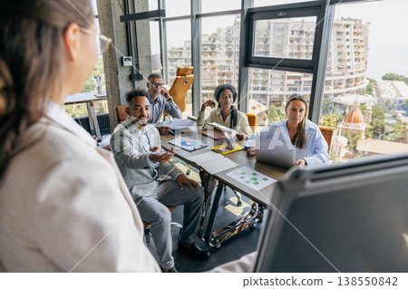 Participants Engage With Speaker Actively. Interactive Workplace With Cityscape Views And Discussions 138550842