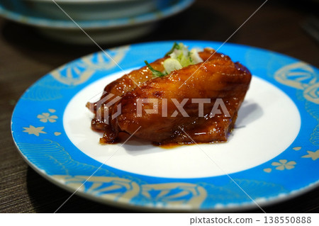 Close-up of tasty eel nigiri sushi in a traditional Japanese sushi restaurant 138550888