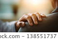 Doctor's hand gently resting on patient's shoulder as a reassuring gesture. 138551737