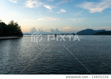 Sunset view of pier on Bolilanga Island, Togian archipelago, Sulawesi, Indonesia 138552158