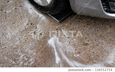 Car washing drain with soap foam waste 138552754