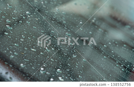 Drops on grey car surface after washing Drops on grey car surface after washing 138552756