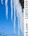 Long natural icicles on a sky background 138553309