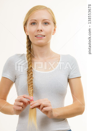 Blonde girl with braid hair 138553678