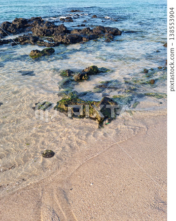 This is a Jeju seascape with basalt rocks. 138553904