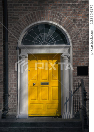 A Yellow Georgian door in Dublin Ireland A Yellow Georgian door in Dublin Ireland 138554175