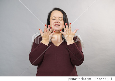 Shocked terrified adult woman 138554281