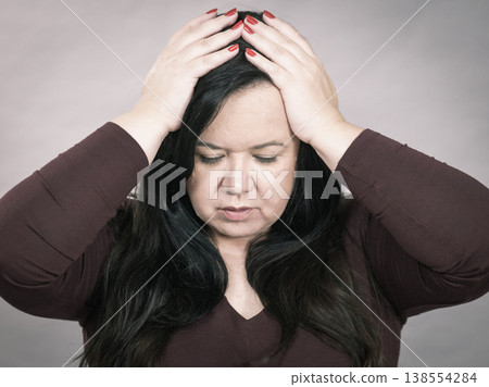 Worried woman having painfull headache Worried woman having painfull headache 138554284