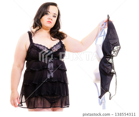 Plus size woman fitting bras Plus size woman fitting bras 138554311