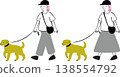 A woman walking a dog 138554792