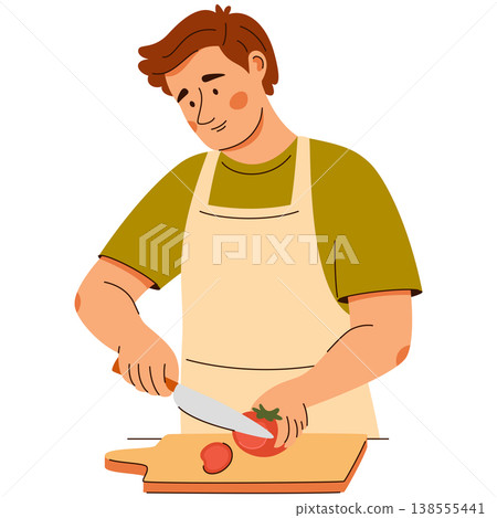 A smiling man in apron slices a tomato on a board. A cozy home cooking scene featuring healthy food 138555441