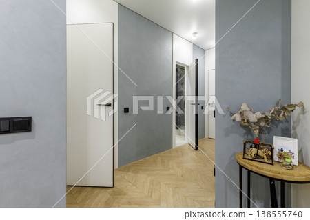 Minimalist Hallway with Open Hidden Door to Bathroom Minimalist Hallway with Open Hidden Door to Bathroom 138555740